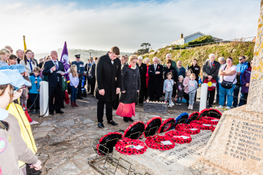 Laying a wreath.